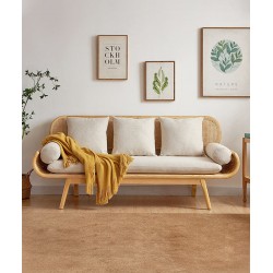 A retro rattan double living room sofa that is the perfect blend of timeless elegance, classic charm and comfort