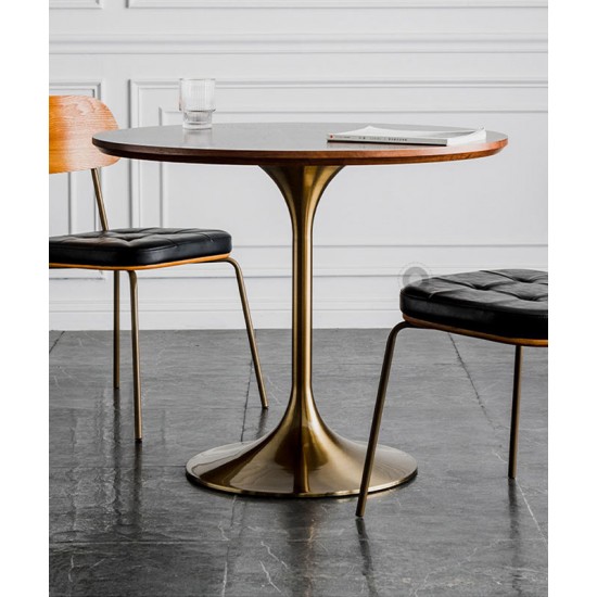 A beautiful dining table in a round cafe table made of light luxury, sturdy material that enhances your dining experience