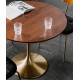 A beautiful dining table in a round cafe table made of light luxury, sturdy material that enhances your dining experience