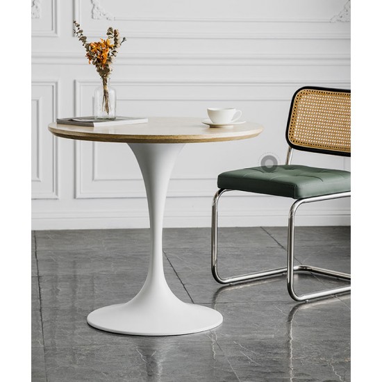 A beautiful dining table in a round cafe table made of light luxury, sturdy material that enhances your dining experience
