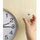 A holder for fixing a clock or mural on the wall, convenient use without damaging the wall