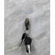 A holder for fixing a clock or mural on the wall, convenient use without damaging the wall