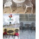 A sleek aluminum small table and chair combination that is the perfect addition to your patio or garden