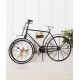 A desktop clock ornament in the shape of a bicycle with a delicate design