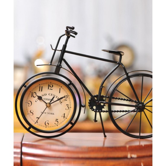 A desktop clock ornament in the shape of a bicycle with a delicate design