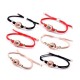 A pair of small rubber bands that vibrate to remember the impulse of long-distance love