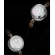 A pair of small rubber bands that vibrate to remember the impulse of long-distance love