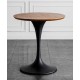 A beautiful dining table in a round cafe table made of light luxury, sturdy material that enhances your dining experience