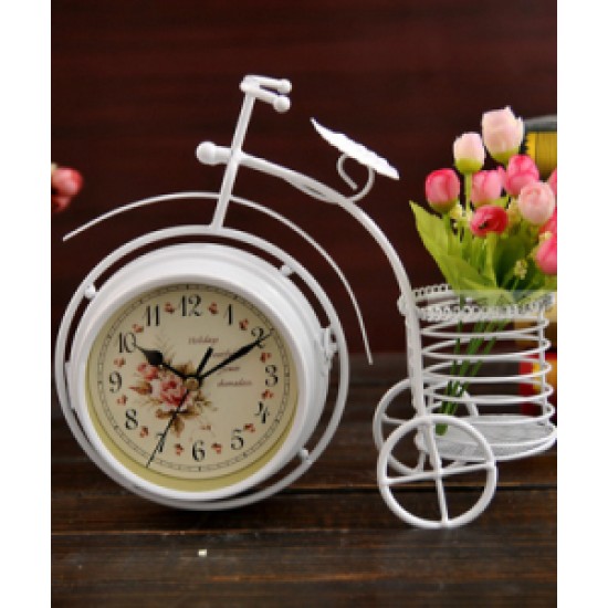 A desktop clock ornament in the shape of a bicycle with a delicate design
