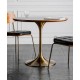 A beautiful dining table in a round cafe table made of light luxury, sturdy material that enhances your dining experience