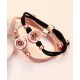 A pair of small rubber bands that vibrate to remember the impulse of long-distance love